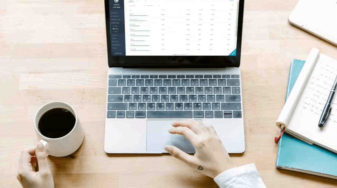 An open laptop on the UWorld website.